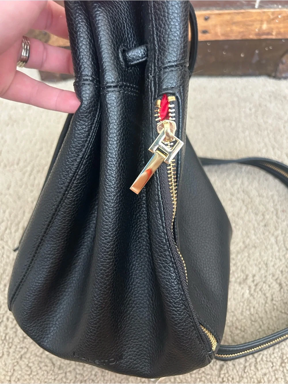 Halston Black Pebbled Leather Drawstring Backpack with Gold Accents